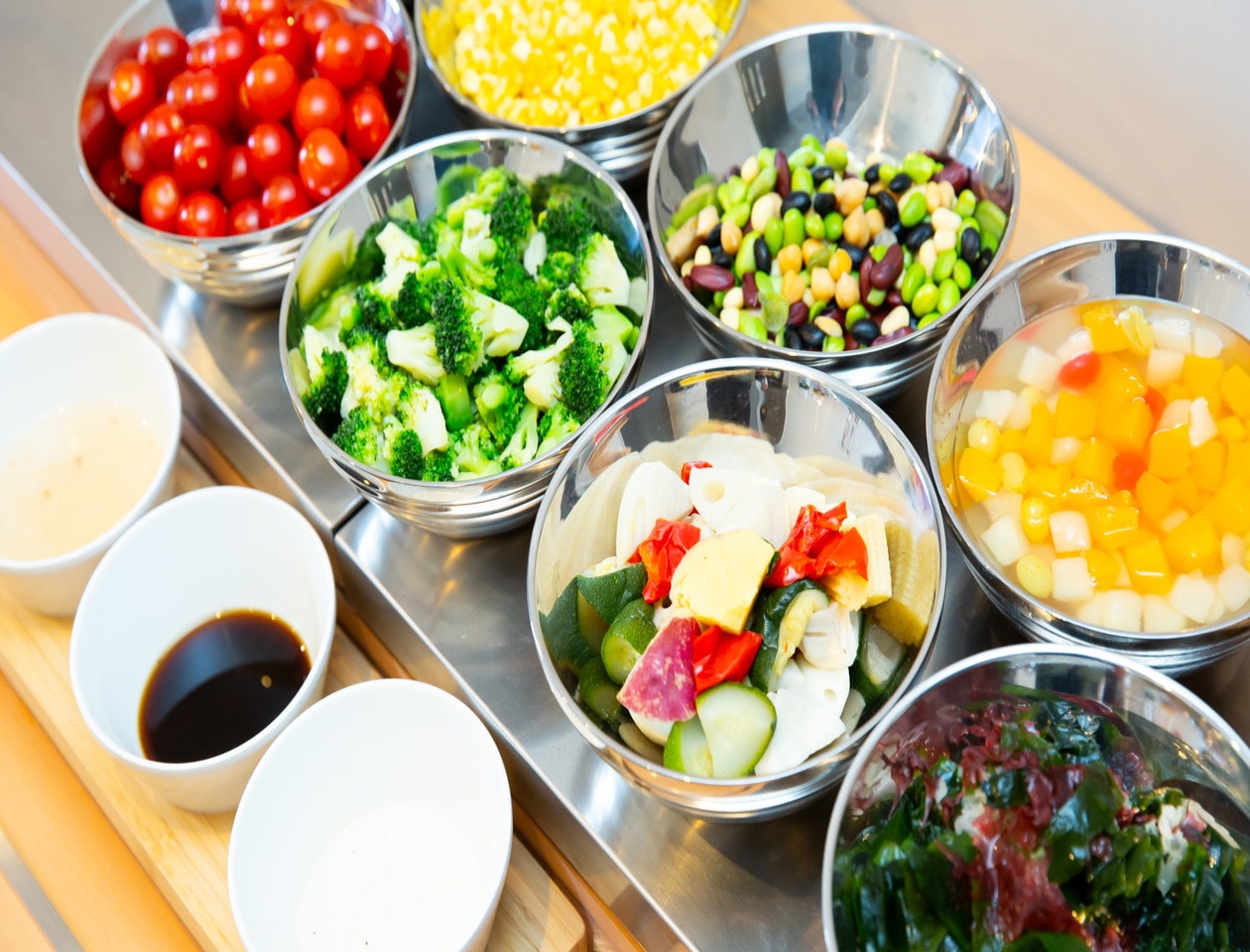 A salad bar with many varieties